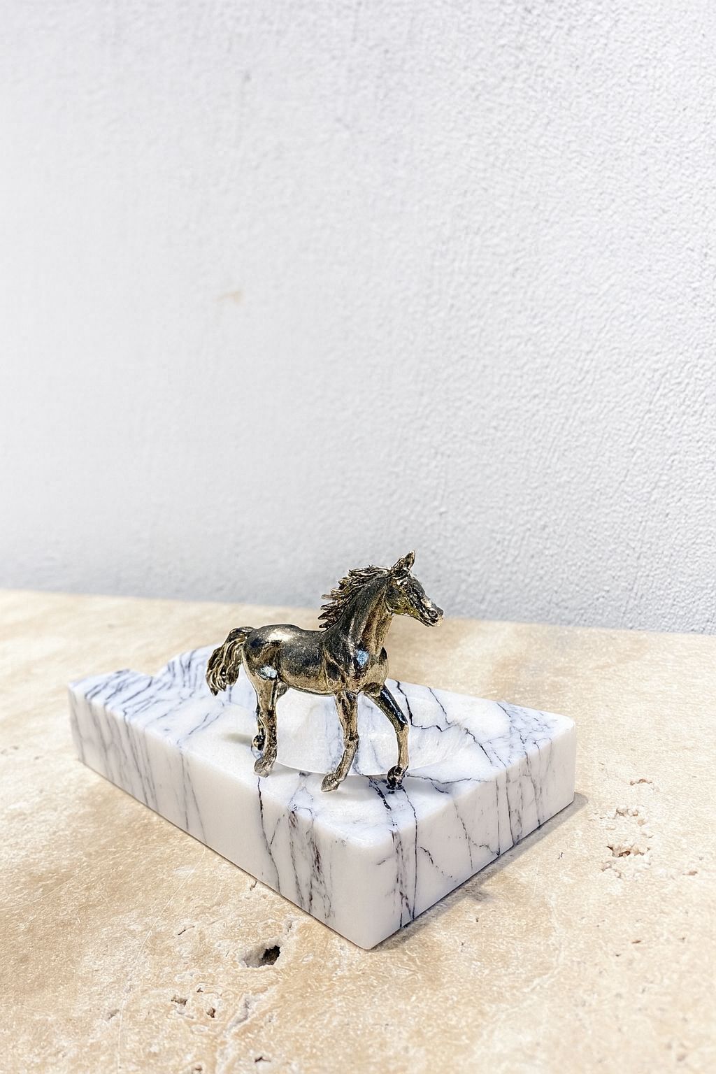 Brass Horse on White Marble Block
