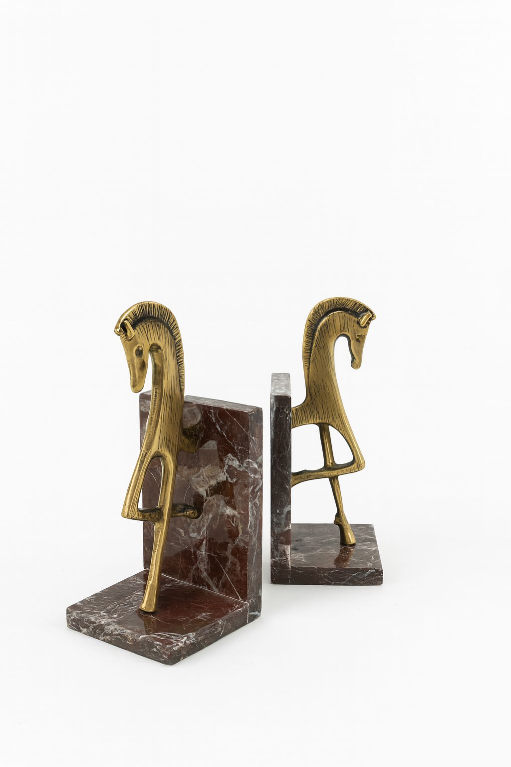 Brass Horse Bookends on Red Marble
