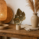 Switch Brass Monstera Leaf Sculpture on Travertine – handcrafted natural beige travertine, view 2 2 image