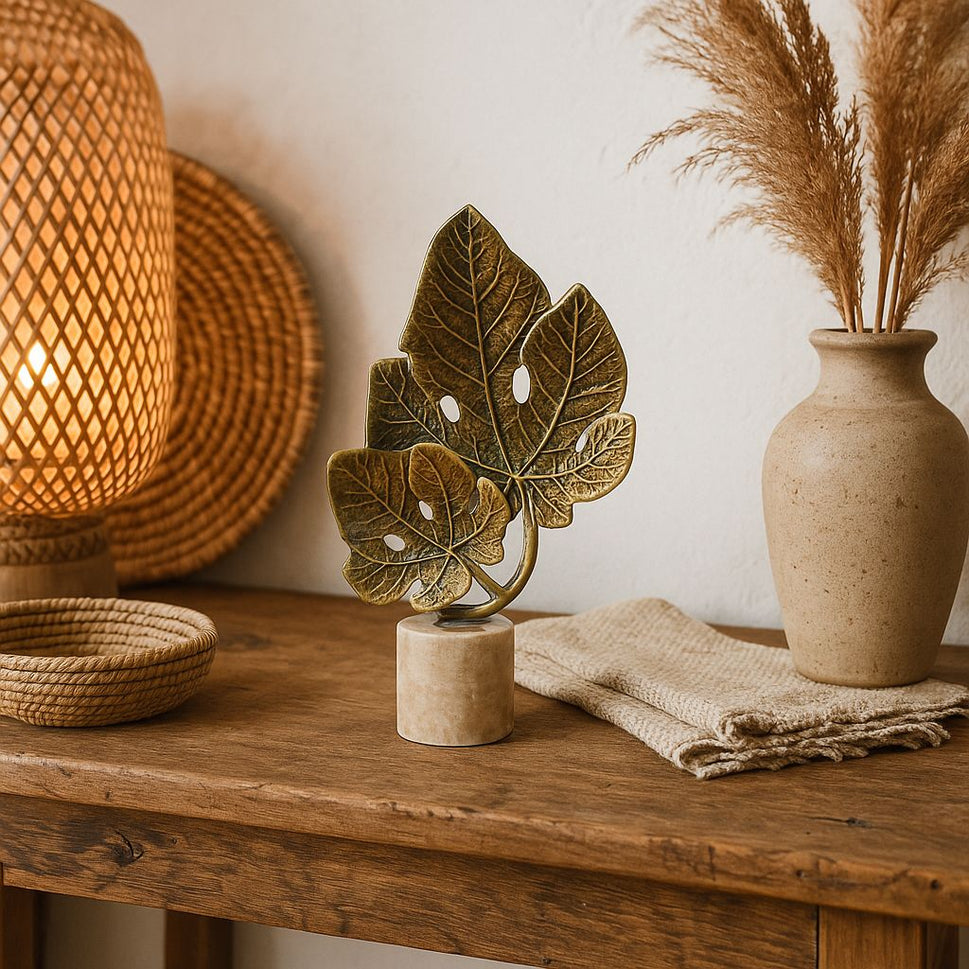 Brass Monstera Leaf Sculpture on Travertine