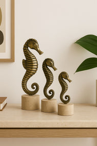 Brass Seahorse Sculptures on Travertine
