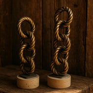 Brass Chain Link Sculptures on Travertine