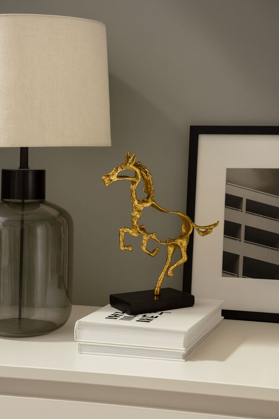 Gold Horse Sculpture on Black Marble