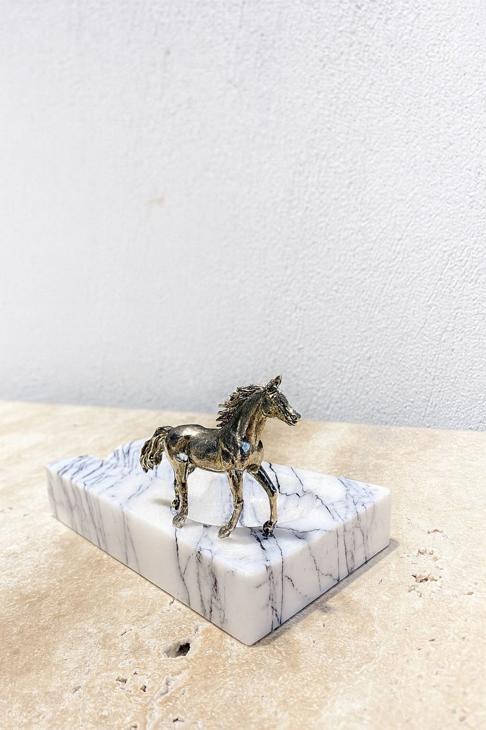 Brass Horse on White Marble Block