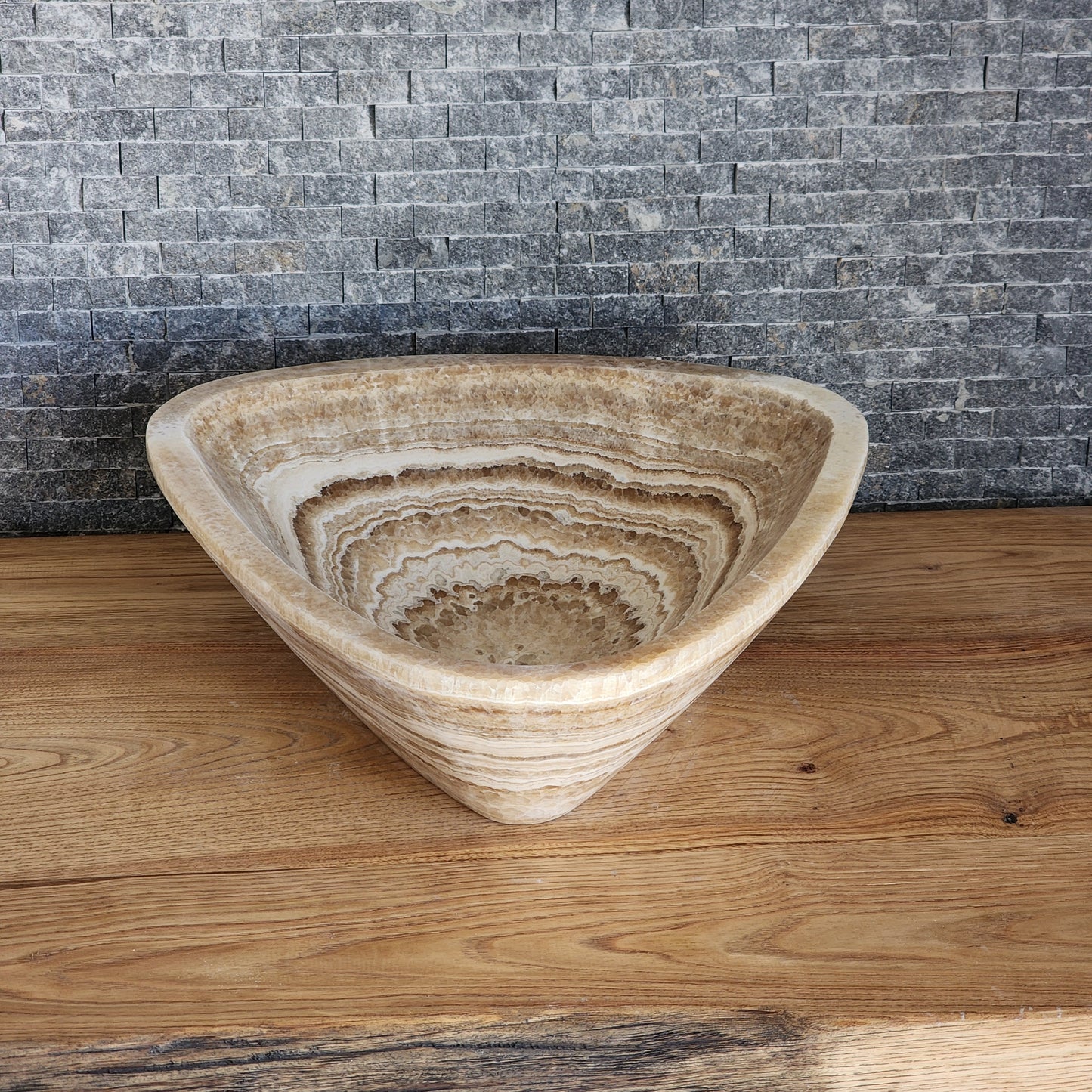 Triangular Exotic Onyx Vessel Sink - Hand-Carved Concentric Stone Basin