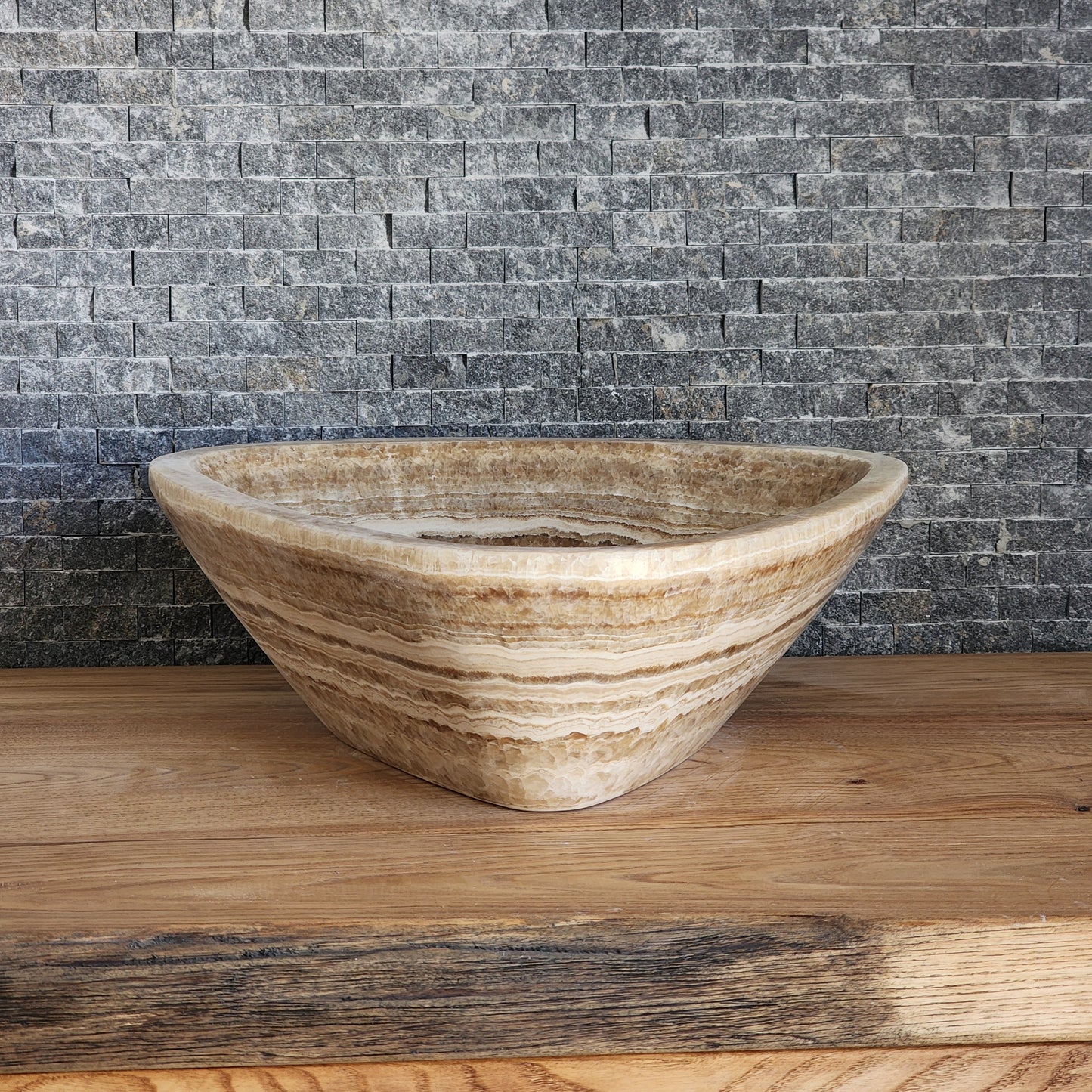 Triangular Exotic Onyx Vessel Sink - Hand-Carved Concentric Stone Basin