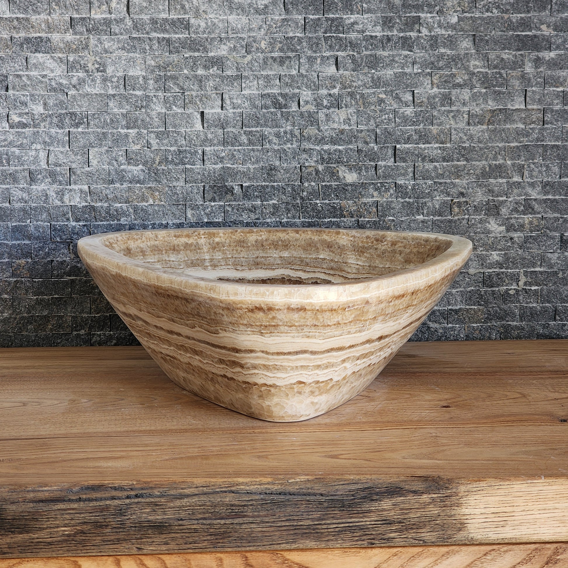 Triangular Exotic Onyx Vessel Sink - Hand-Carved Concentric Stone Basin