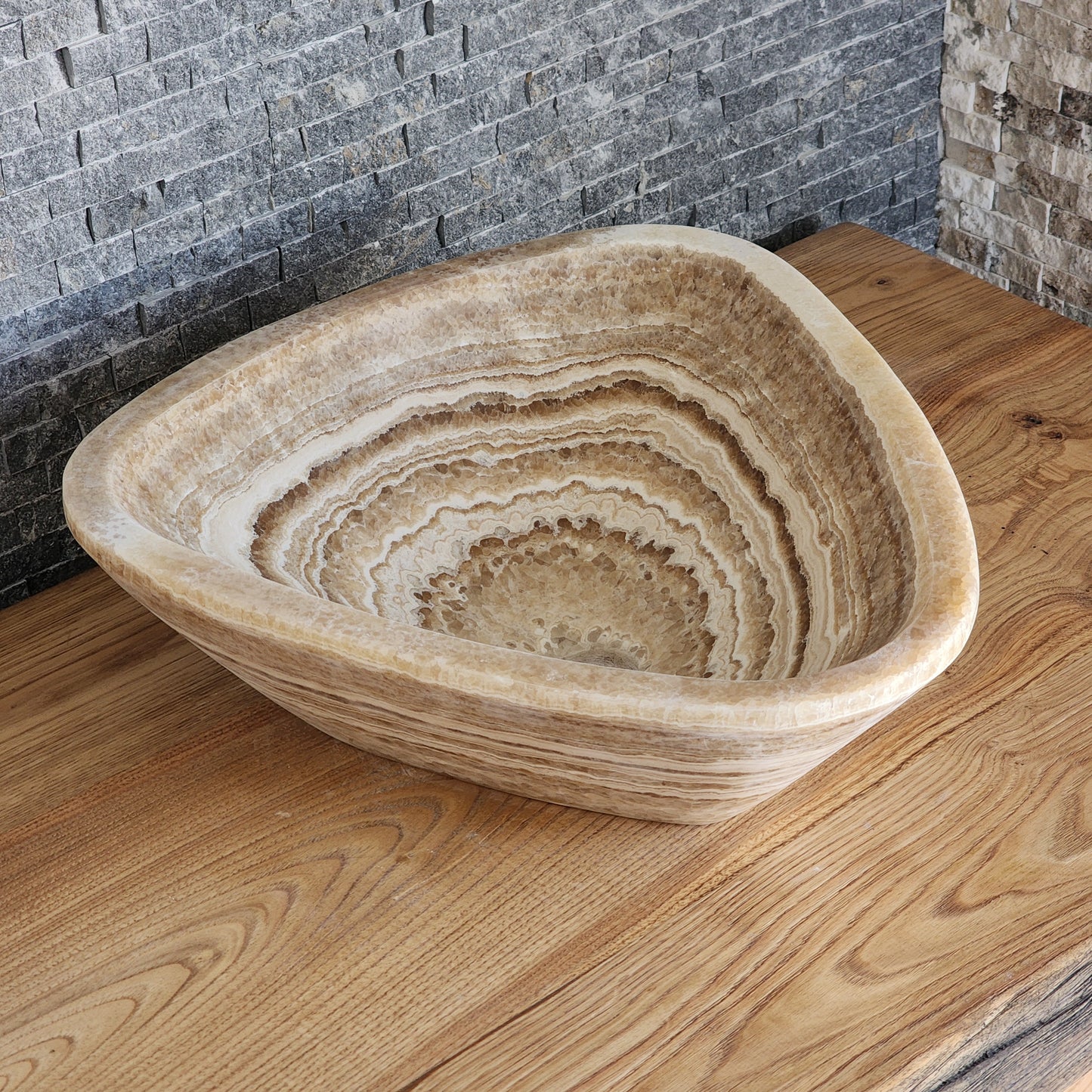 Triangular Exotic Onyx Vessel Sink - Hand-Carved Concentric Stone Basin